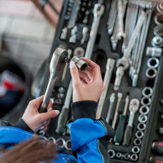 mechanic examining tools